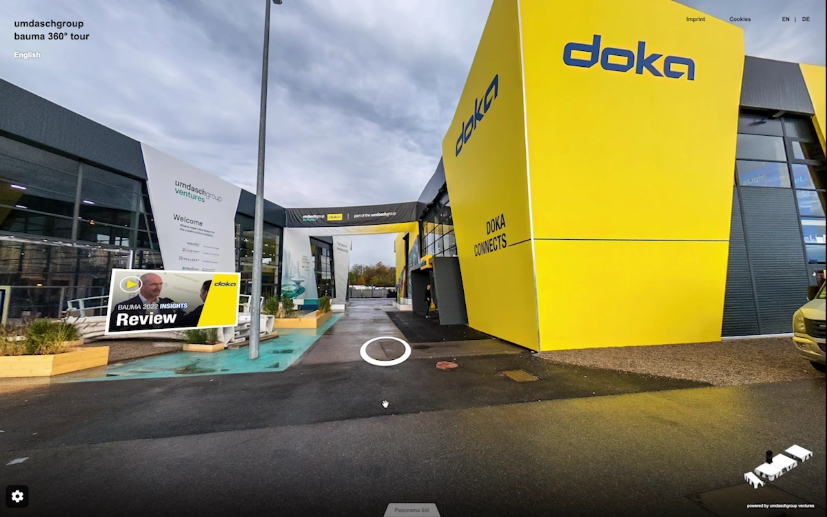A virtual 360-degree view of the yellow Doka exhibition pavilion at bauma.
